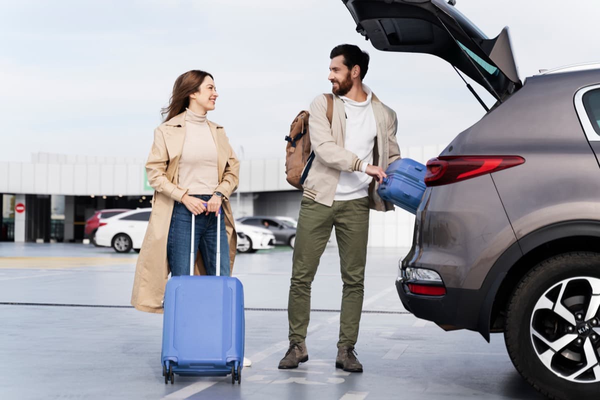 Travellers storing luggage before checking into their apartment