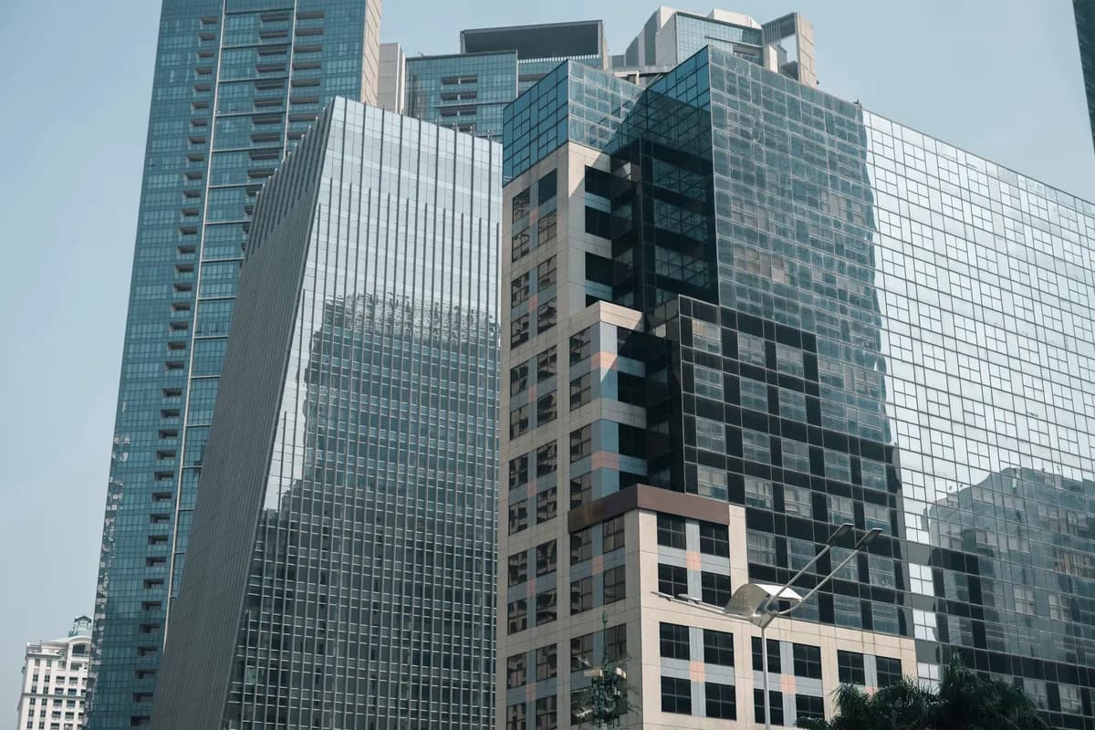 Modern office towers representing OnePlace's serviced accommodation