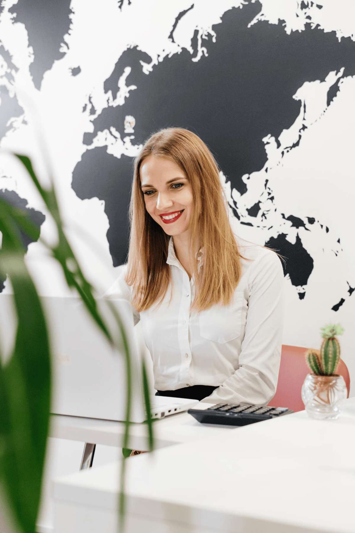 Travel manager reviewing business stay reports and analytics
