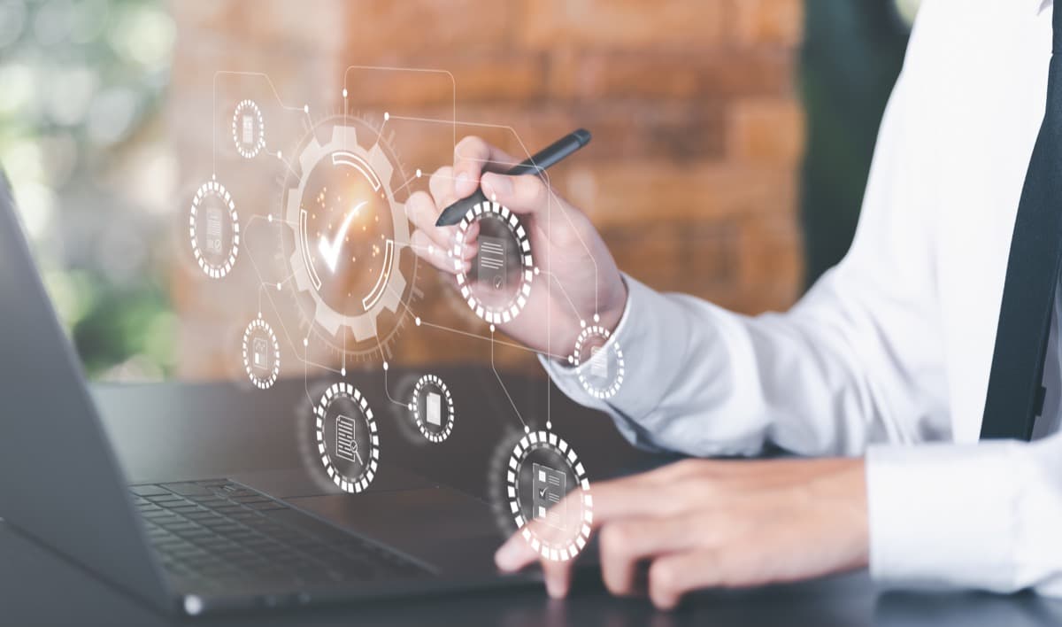 Digital security and housing standards icons on a professional workspace screen