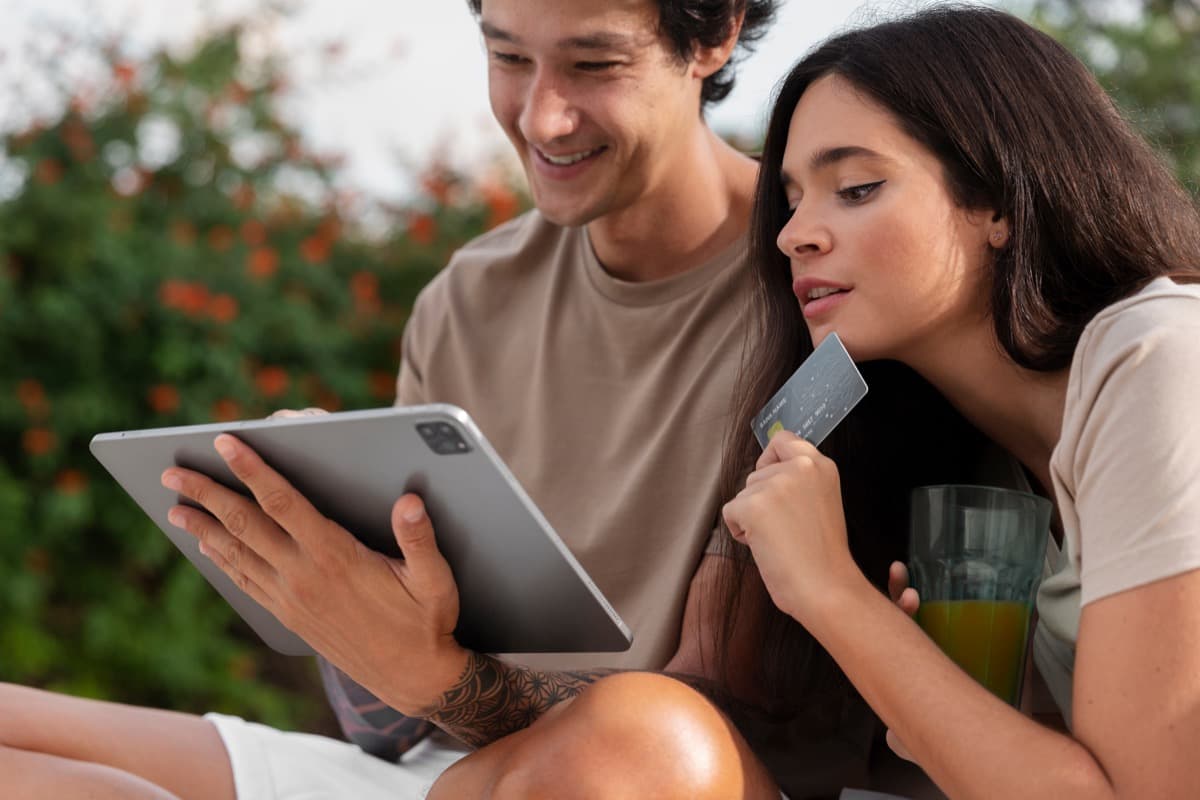 HR team reviewing corporate relocation apartment offers on a tablet
